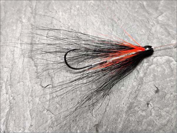 Needle Tube Fly with single free-swinging hook